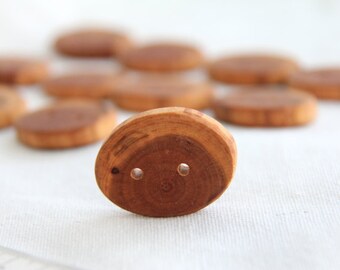 4 medium cherry oval buttons- 1-1/8 x 1-1/2"