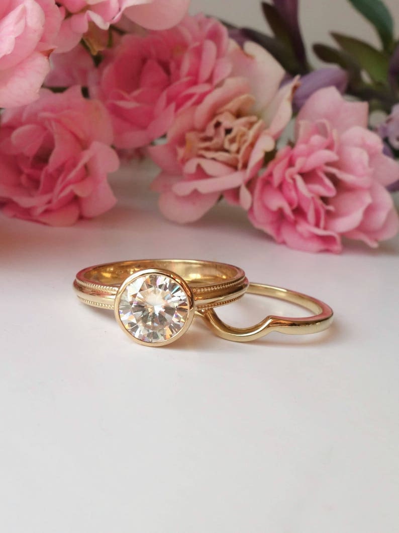 Interlocking gold band set on Etsy