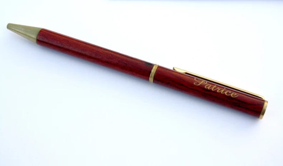Engraved wood pen