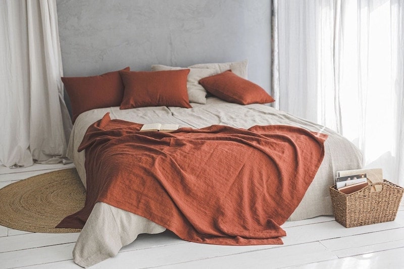 Burnt orange linen throw from Etsy seller ForestlandLinen