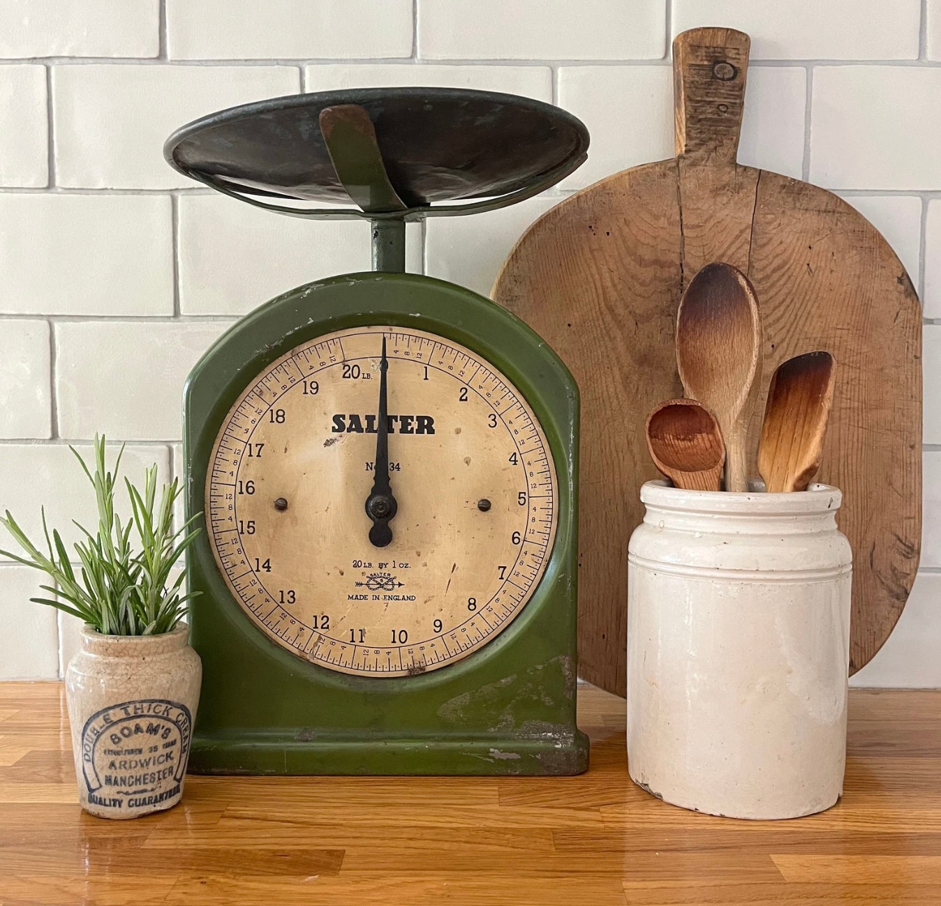 A vintage green kitchen scale