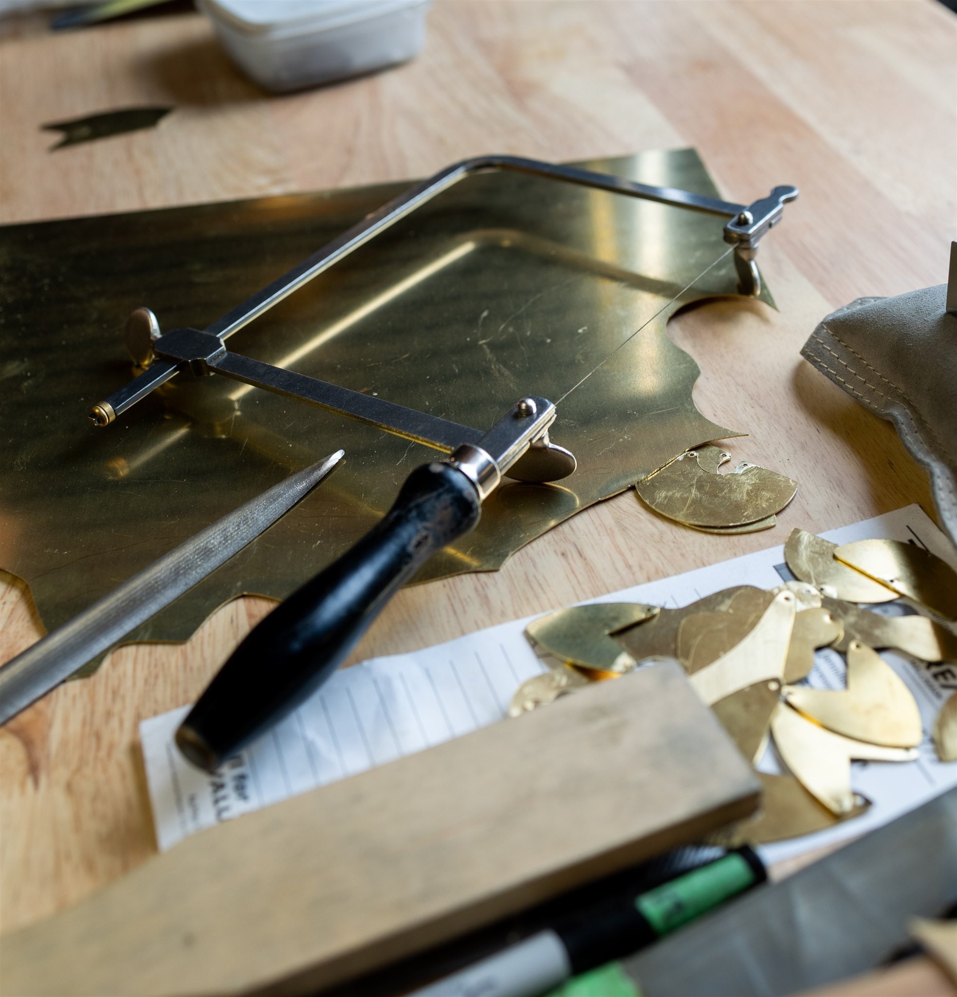 Jewelry pieces for earrings in Jordan Clarke's studio.