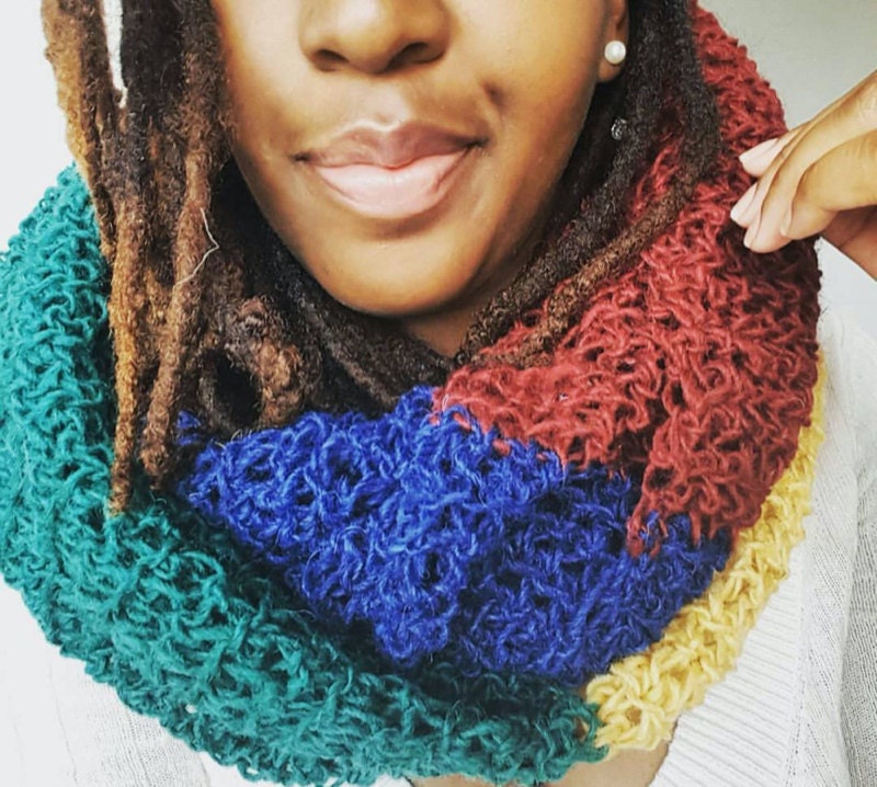 A crochet infinity scarf from FAMEousJ, a Black-owned business on Etsy.
