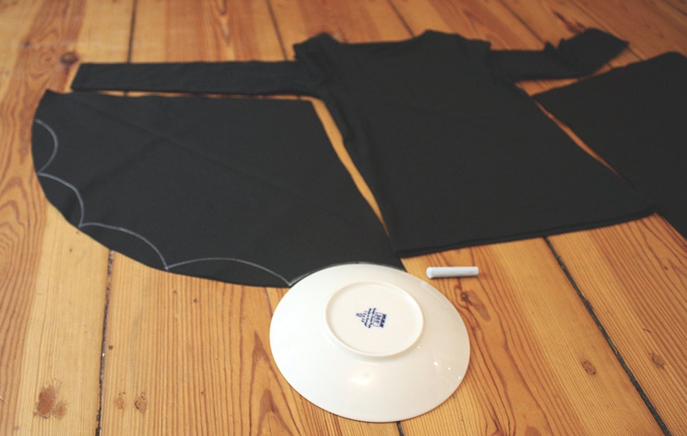 Tracing the wing shape of a DIY bat costume