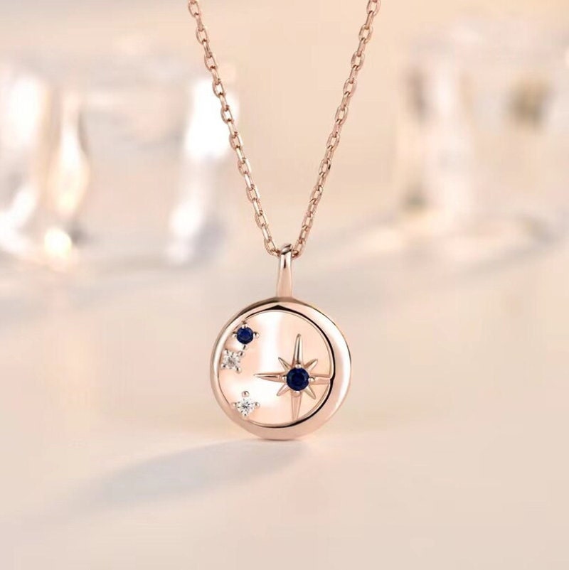 Mother of pearl star and moon round necklace