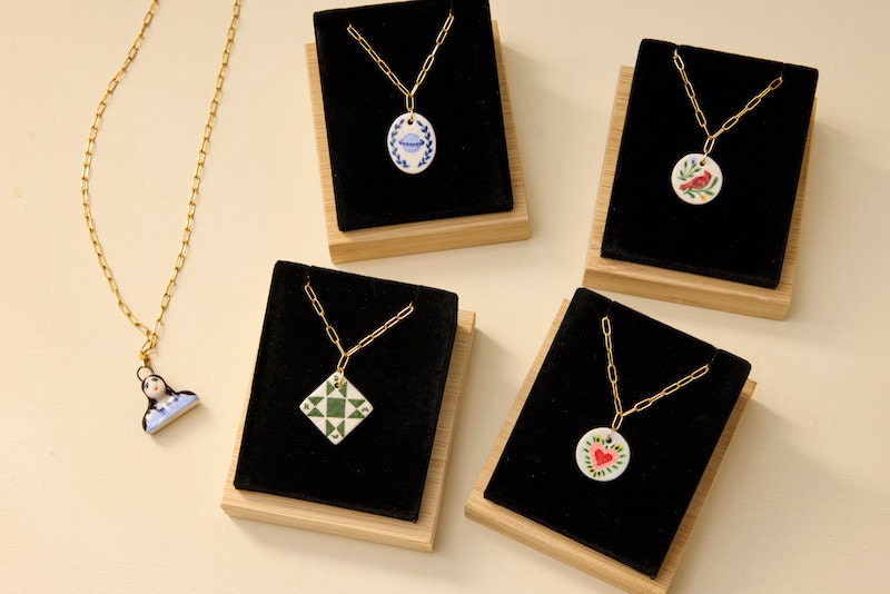 Five charm necklaces from the Charmed by Kacey collection