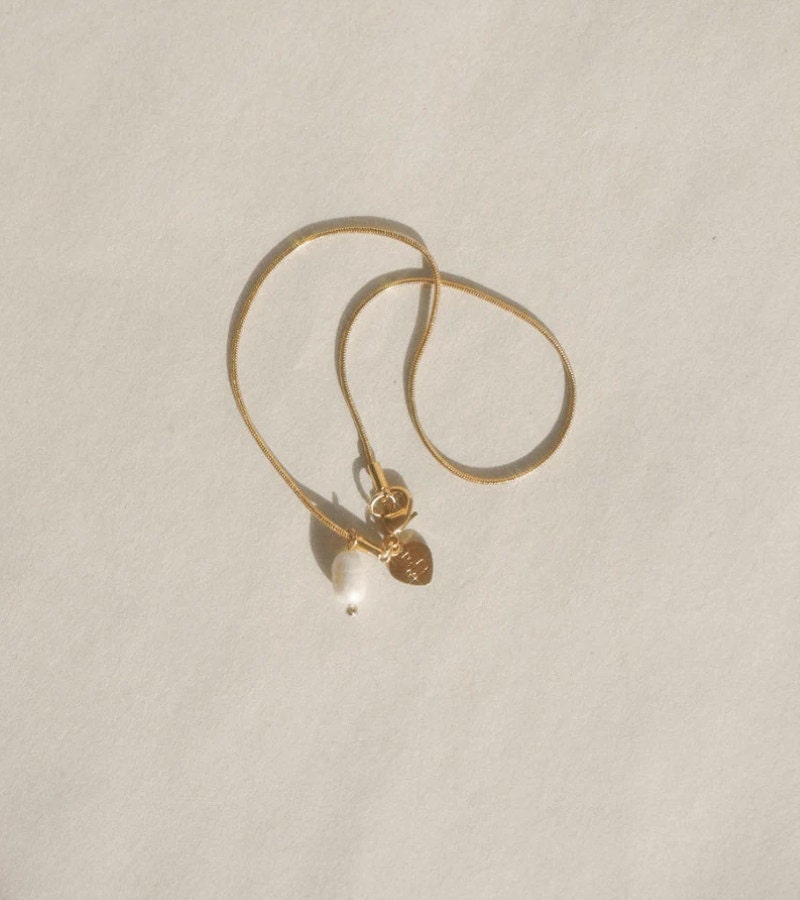 Dainty pearl and gold chain anklet