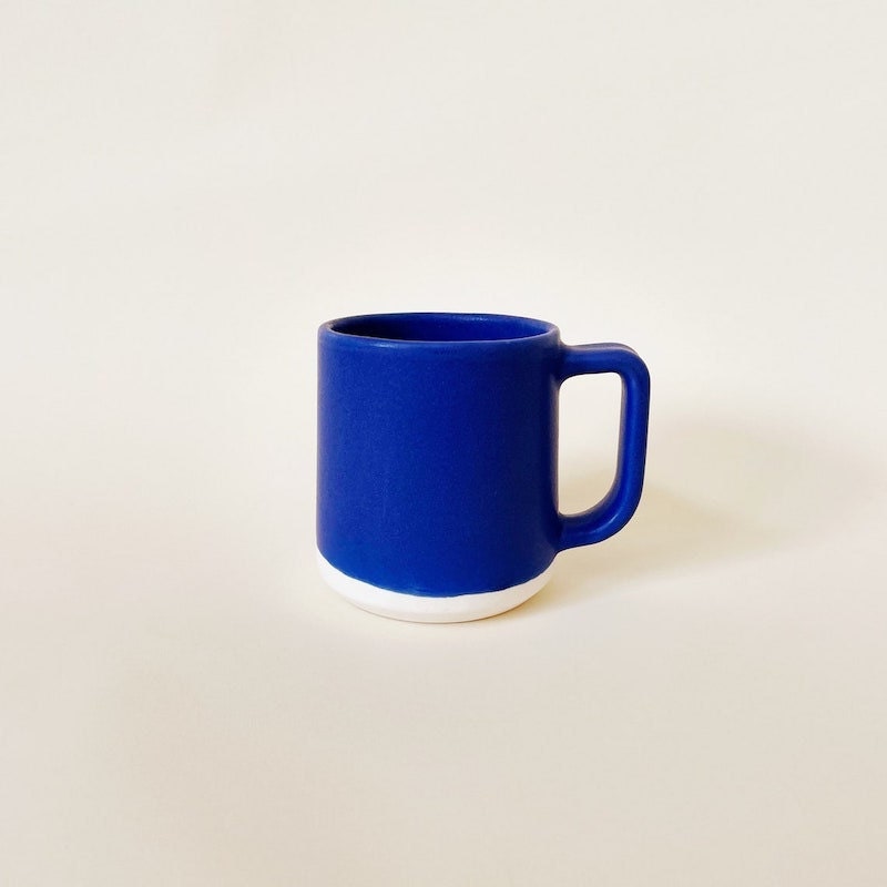 Blue ceramic mug from Paper & Clay