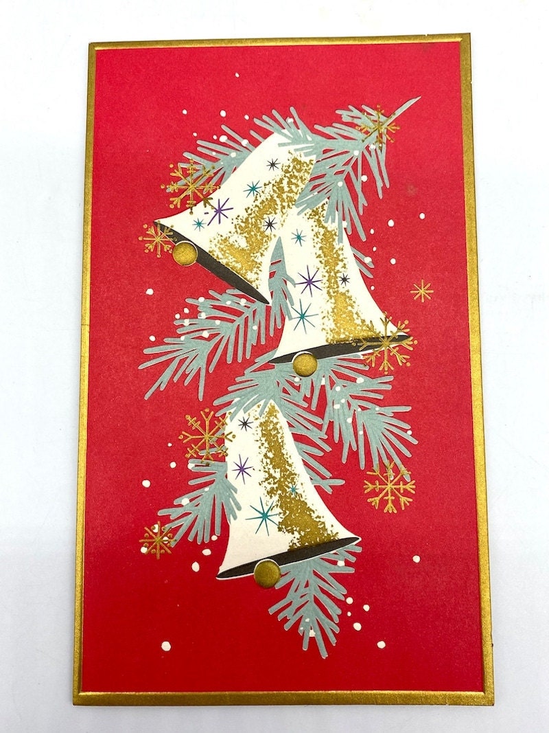 A vintage Christmas card featuring a red background and three bells.