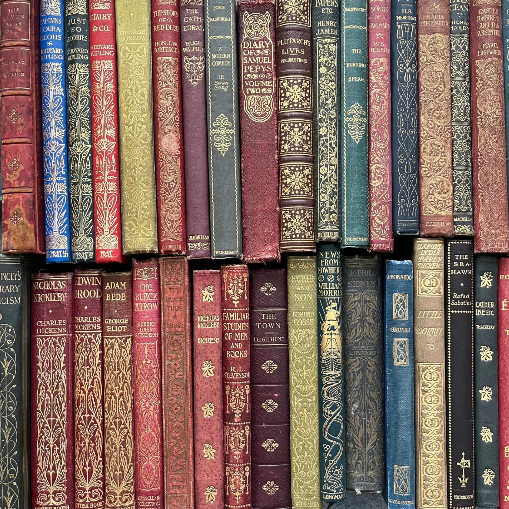 A collection of beautiful vintage hardcover books with gold embossed lettering