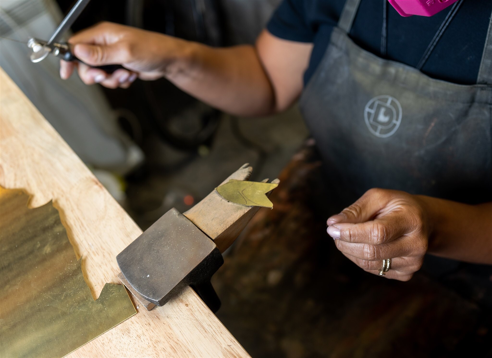 Jordan Clarke making earrings for Enarmoured in her studio.