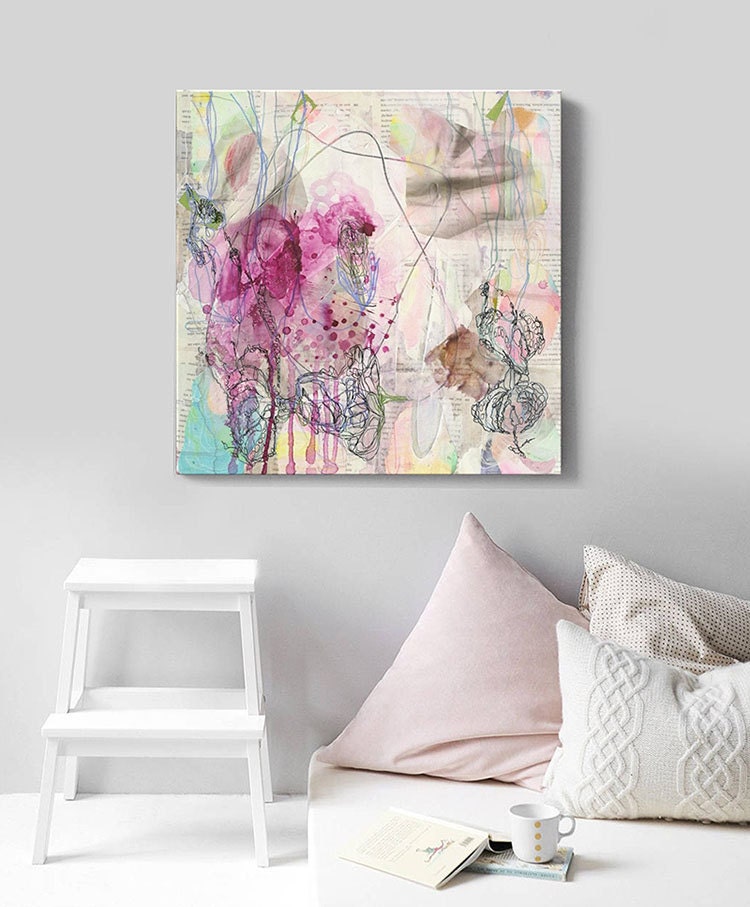 Original abstract painting hanging in a bedroom