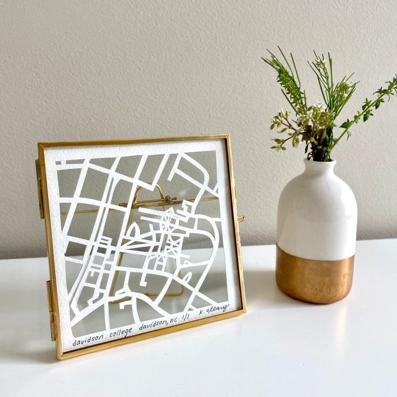 Hand-cut miniature map artwork from Etsy