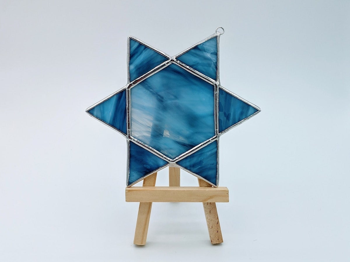 A stained-glass Star of David from Strong Family Creation A stained-glass Star of David from Strong Family Creation