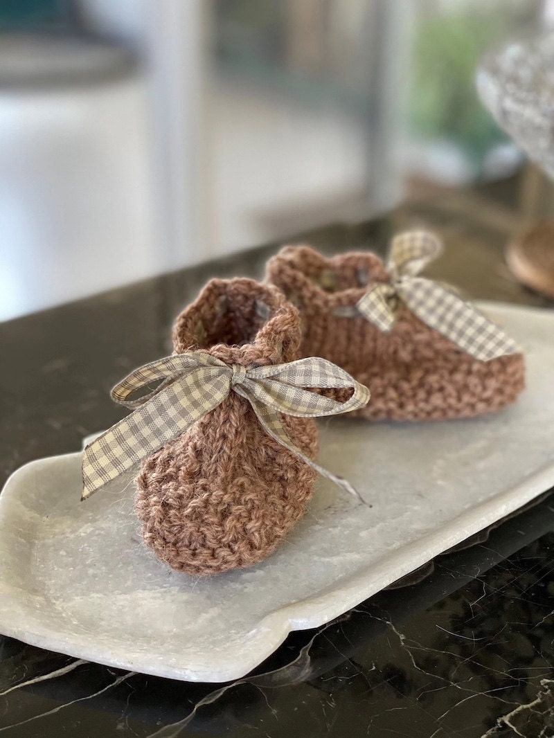 Baby booties from Etsy Seller BootiesAndBowsShop