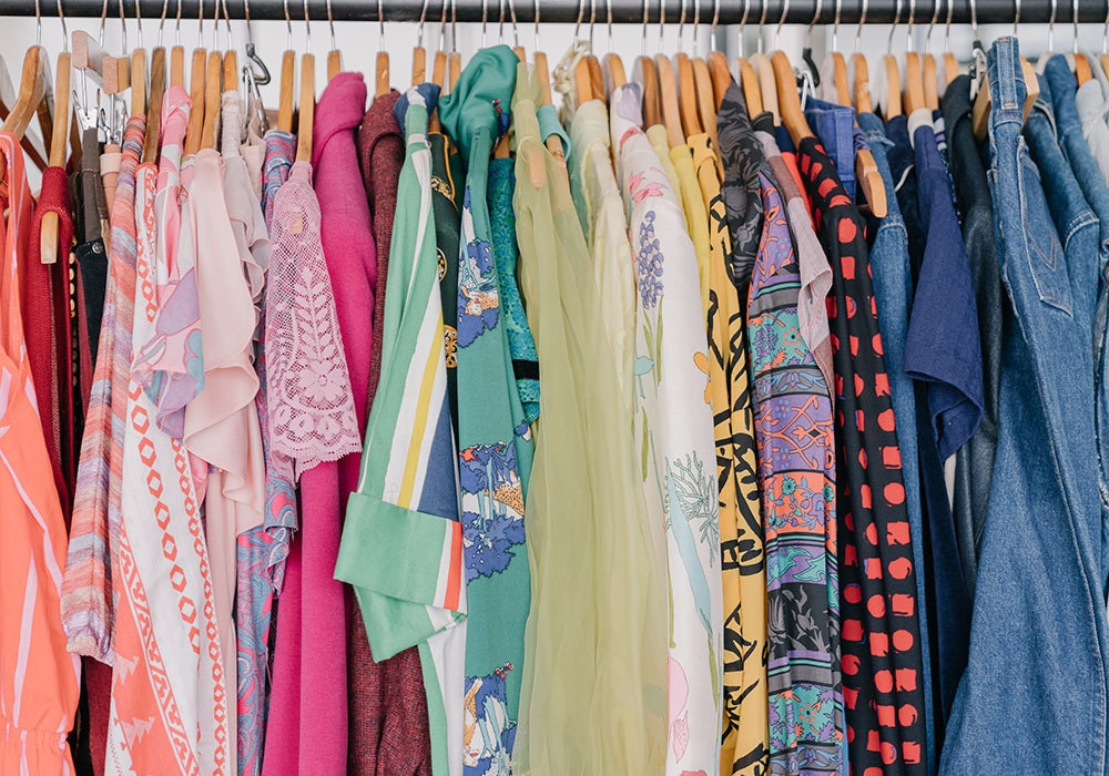 Rack of colorful vintage clothing