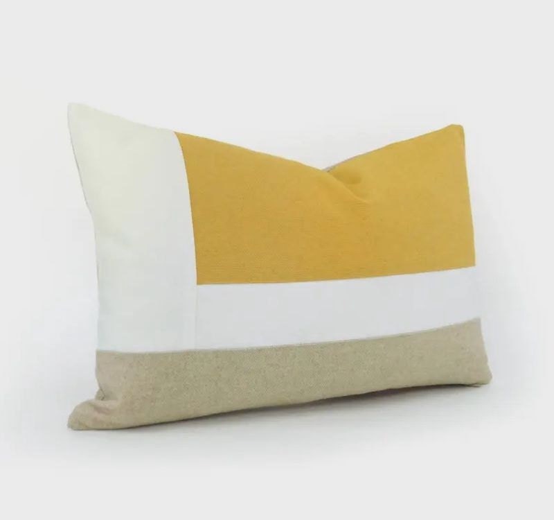 White, yellow and grey blocked pillow