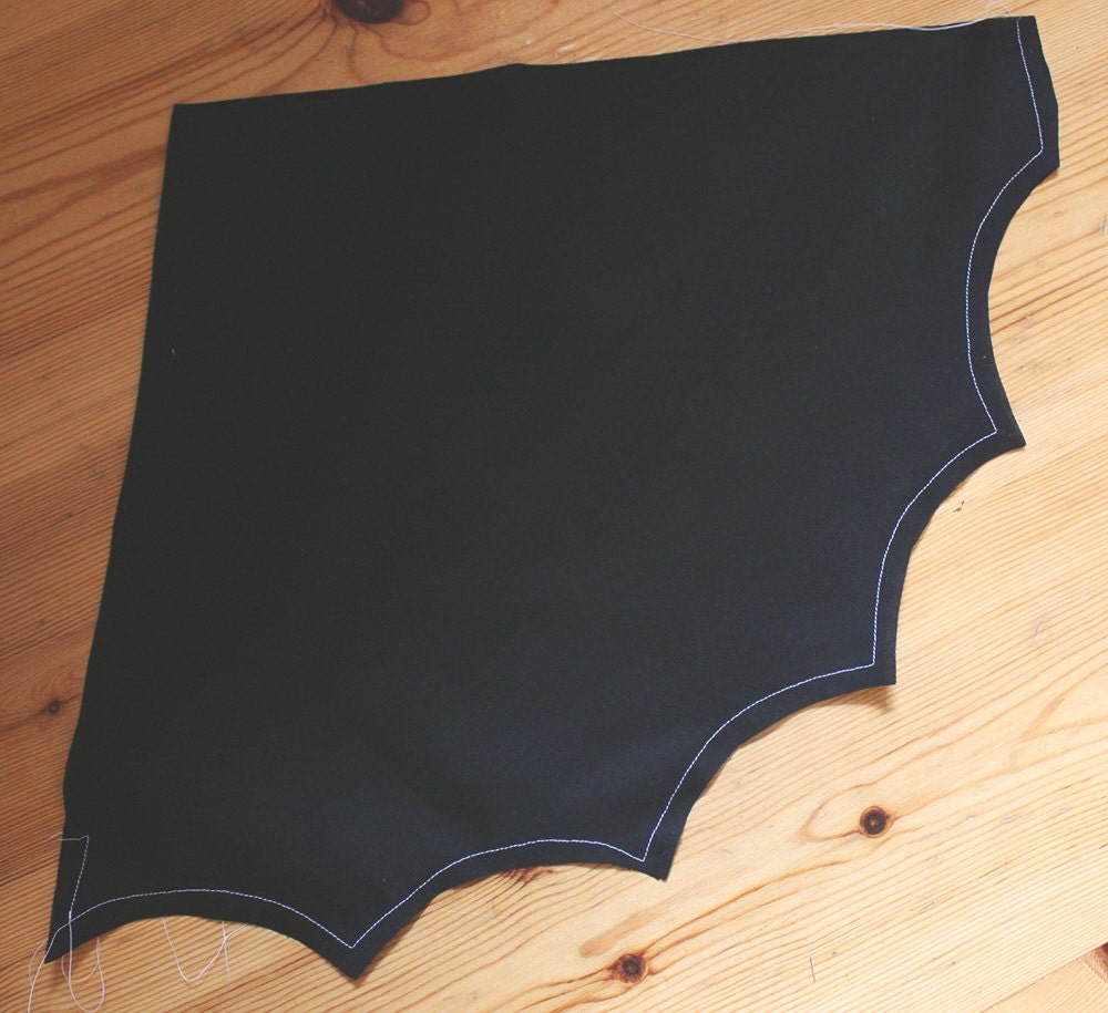 The sewn wings of a DIY bat costume