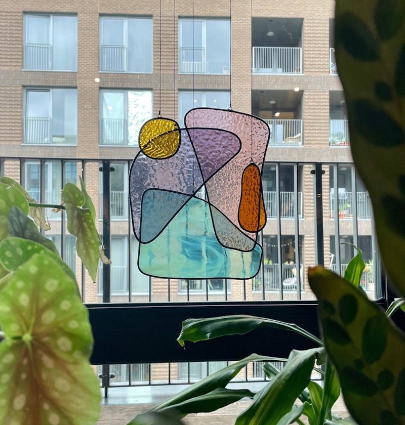 A stained glass piece from Multiple Shapes on Etsy.