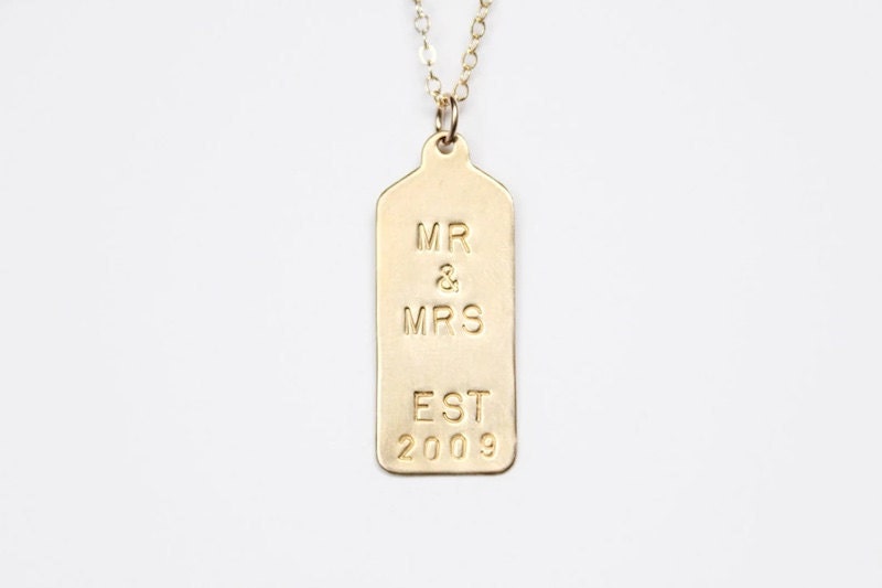 Hand-stamped gold tag necklace from Etsy