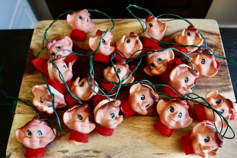 A string of vintage elf Christmas lights.