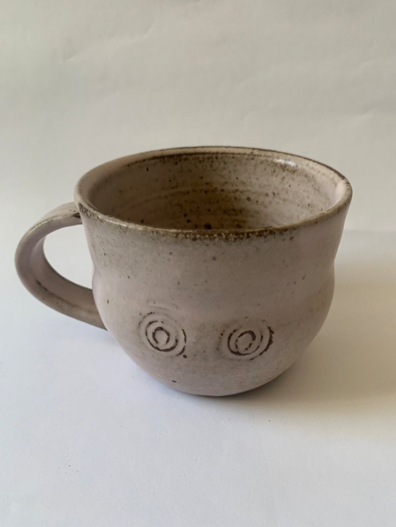 A handmade ceramic mug from CLAY, by Kimberleigh—a Black-owned shop on Etsy.