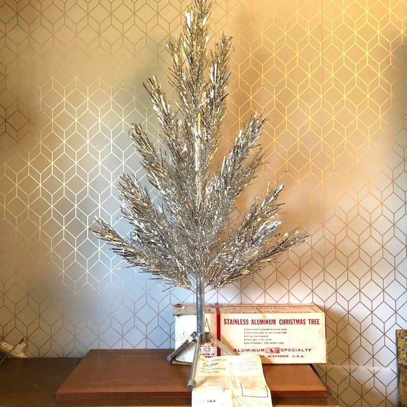 A small vintage aluminum Christmas tree.