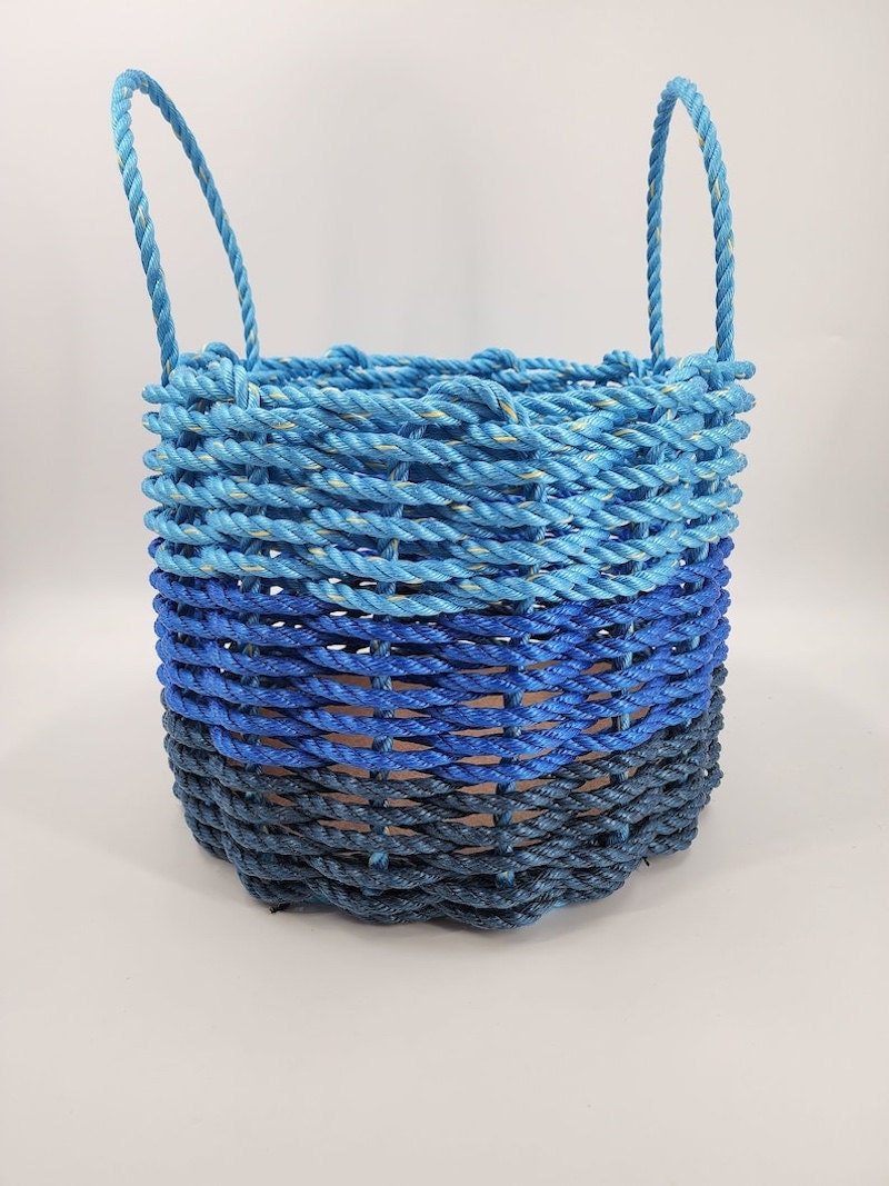 An ombre woven basket in blue.