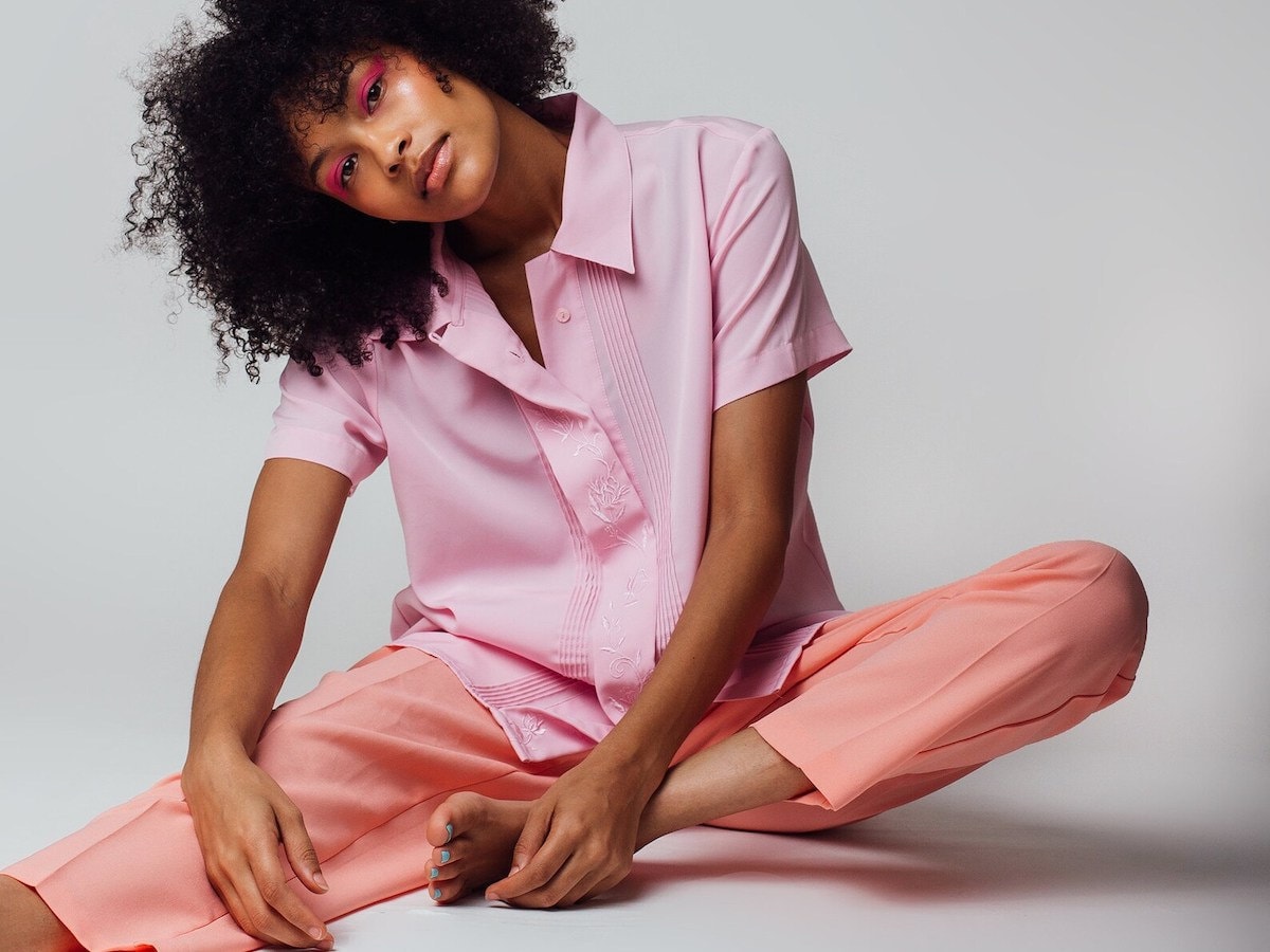 A model wearing a springy vintage top and pants. A model wearing a springy vintage top and pants.