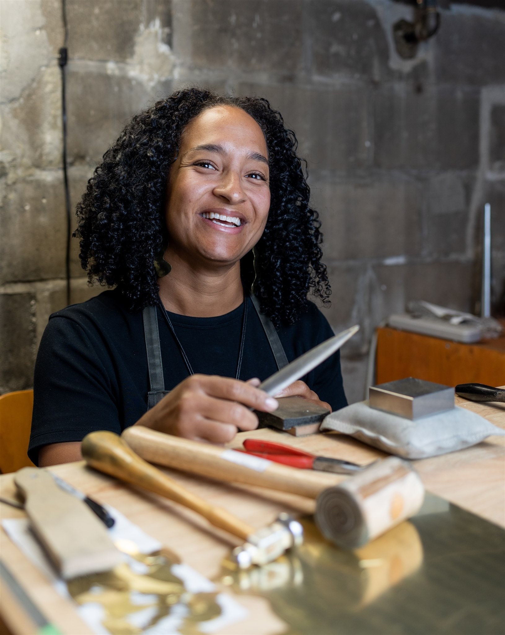 Portrait of Enarmoured founder Jordan Clarke in her studio.