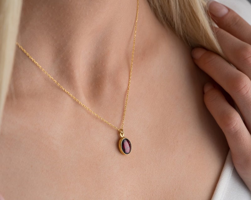 Gold garnet birthstone pendant for January