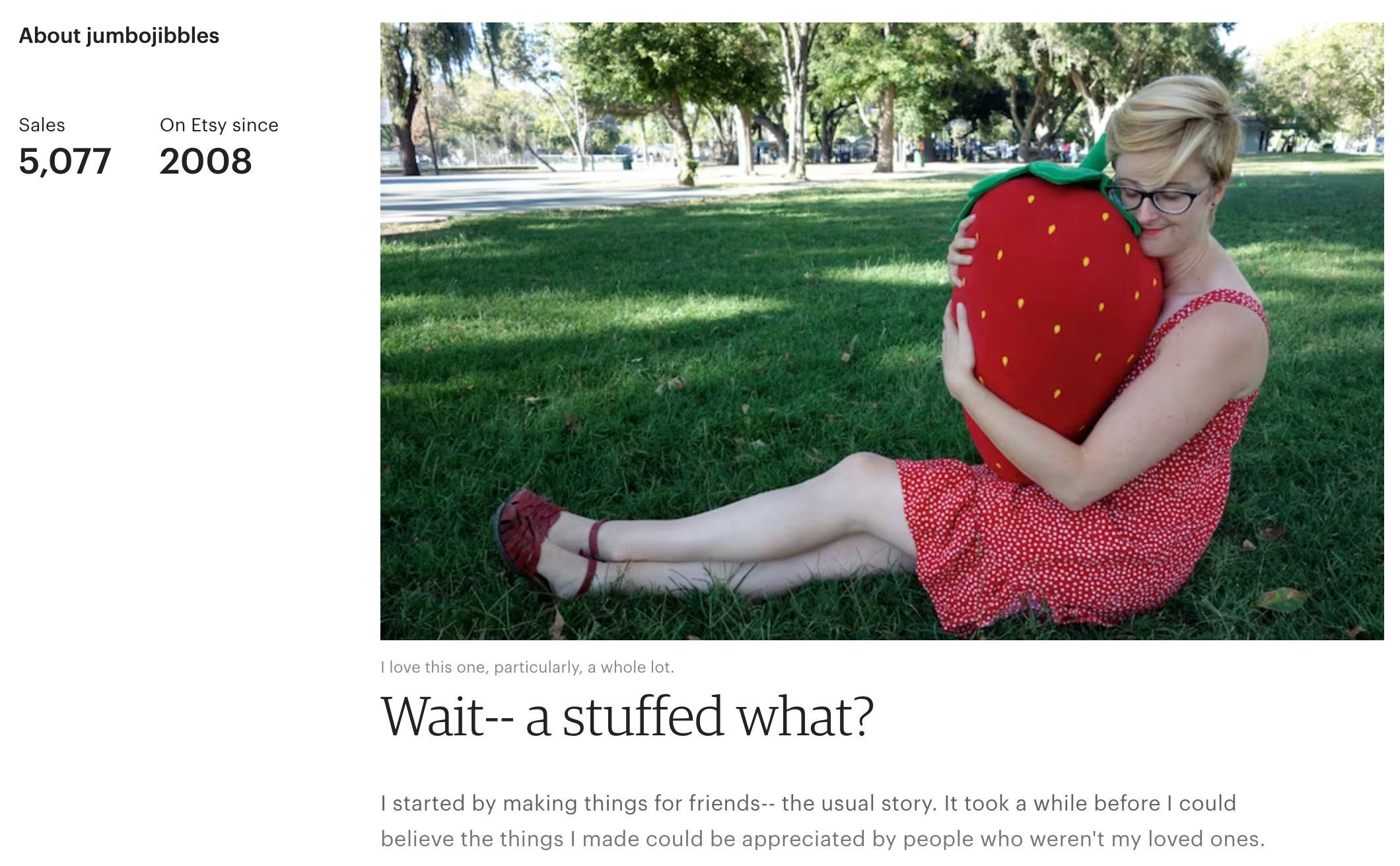 A preview of Amy Brown's about section, featuring a woman embracing an oversized stuffed strawberry plush