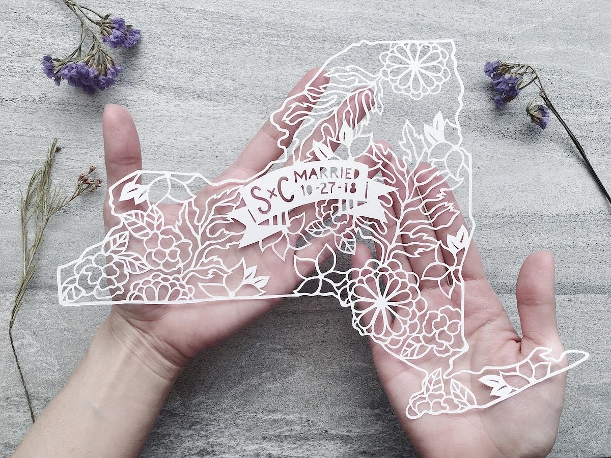 State-shaped floral paper cut-out from Etsy