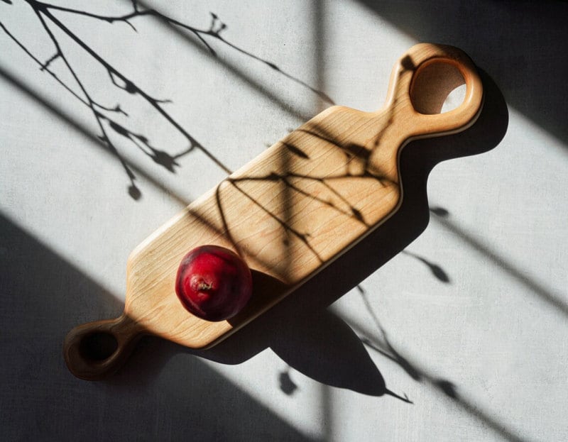 A wooden serving board from Untitled Co on Etsy