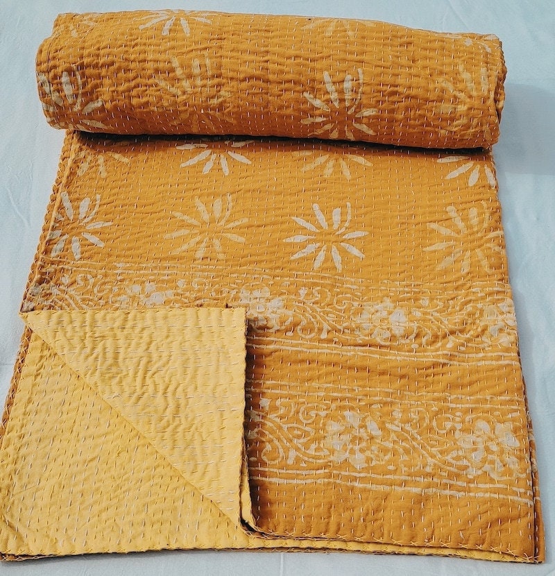 Mustard yellow kantha throw from Etsy seller Saanvisince1988