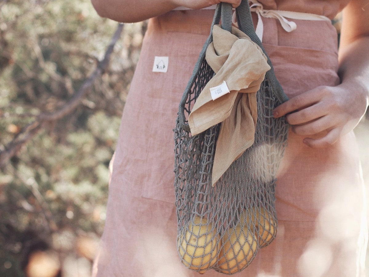 A plant-dyed, reusable market bag from Etsy.