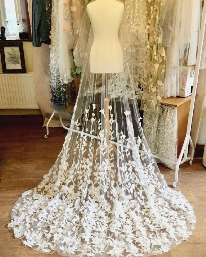 Flowing flower floor length veil and cape