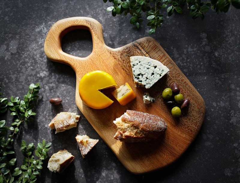 An organic-shaped serving board from Untitled Co on Etsy