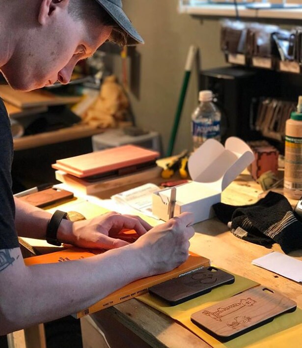 Joel packing phone case orders