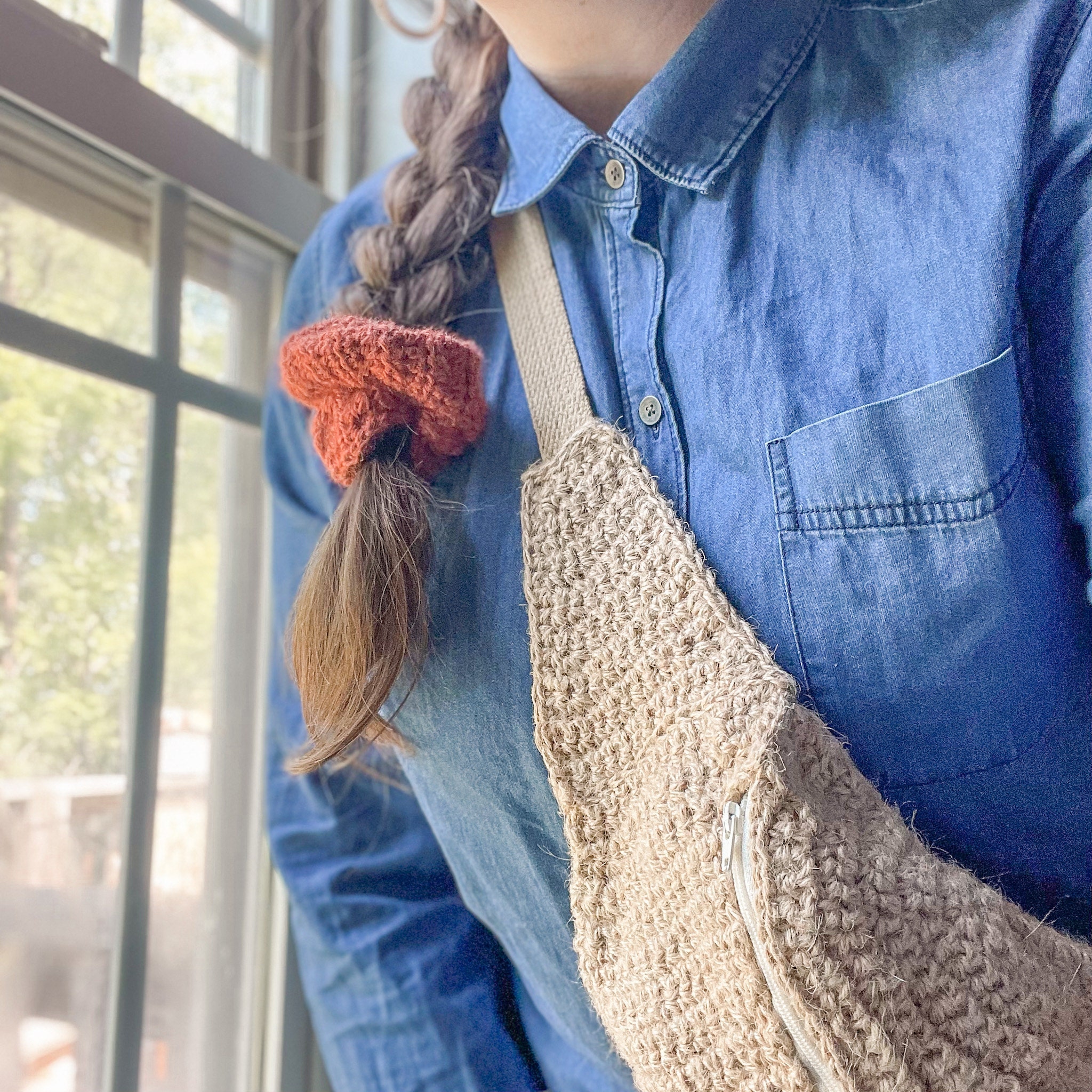 Woman wearing crochet bag and scrunchie