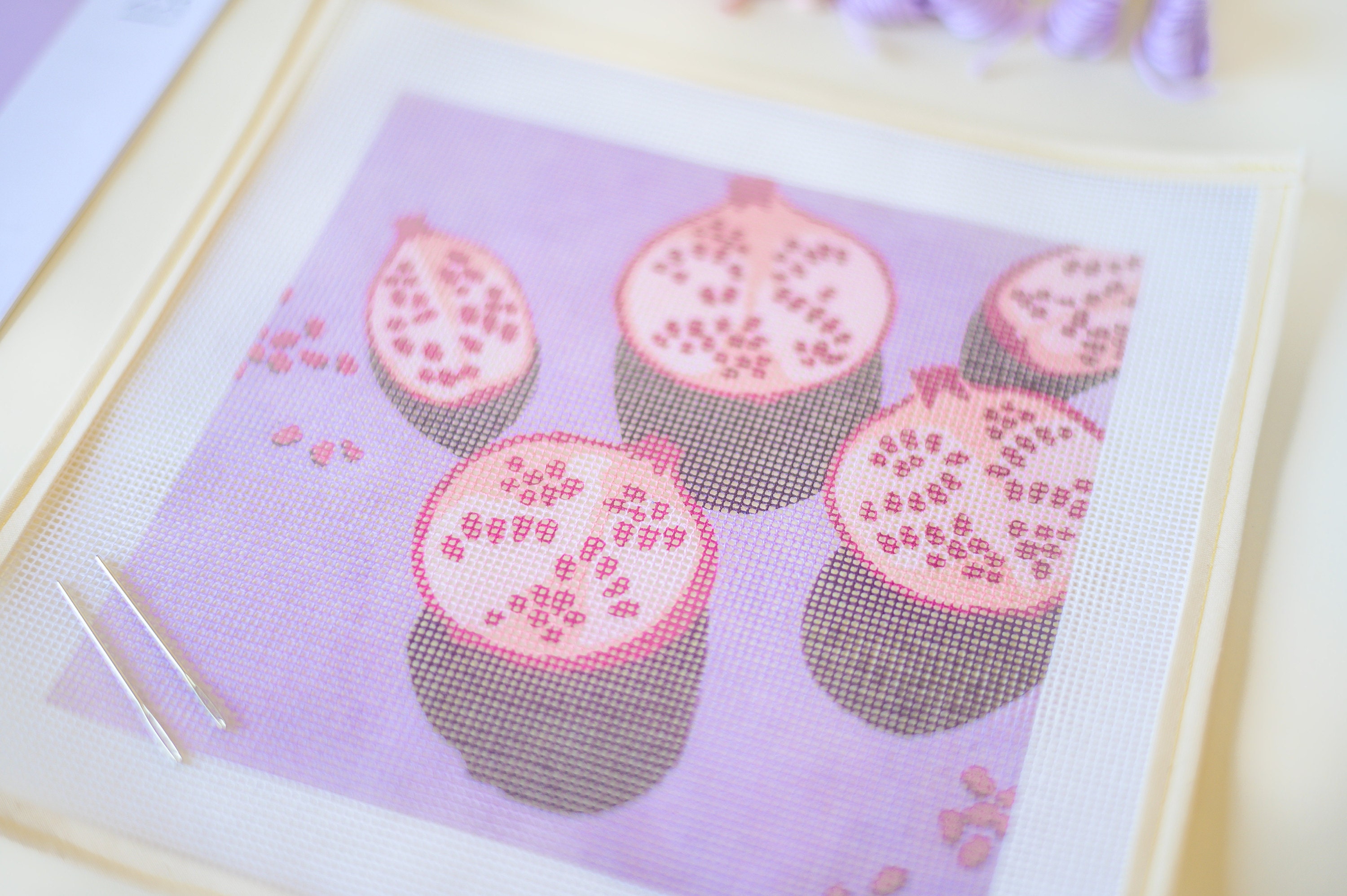 Lilac and pink pomegranate printed needlepoint canvas from Unwind Studio designed by Laura Croft