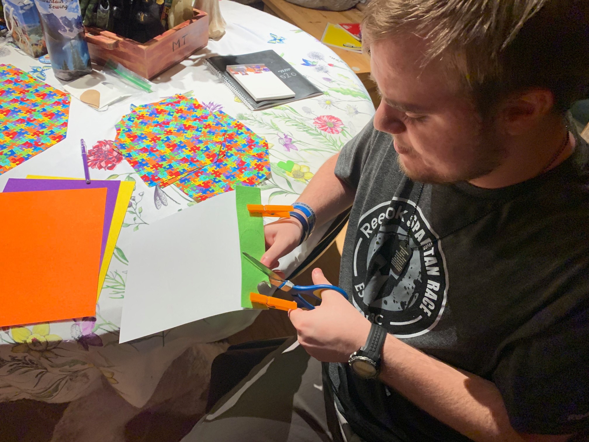 Cutting out felt hearts to put on our one-of-a-kind Autism Pet-Bandanas