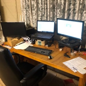 My desk with three screens