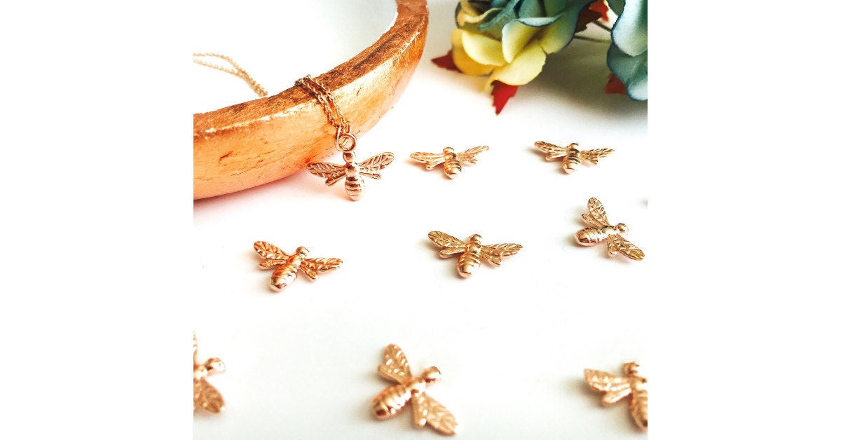 Some of our pieces are made with 14, 18 and 24 carat gold vermeil pendants and charms.