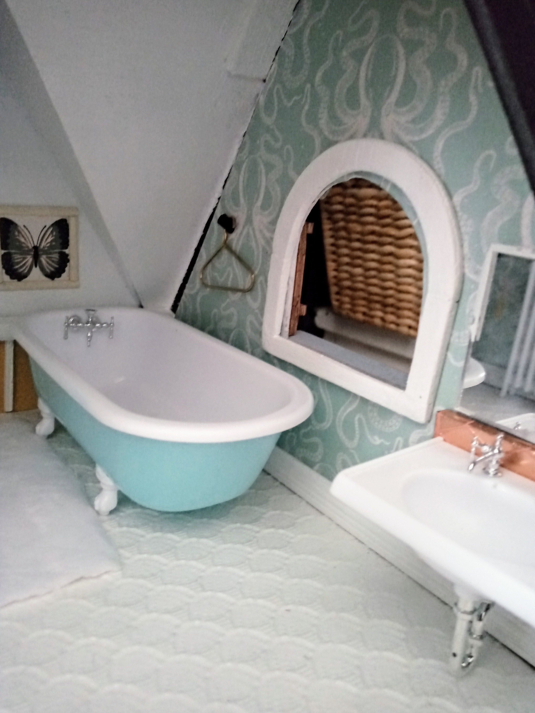 Upstairs Bathroom octopus wallpaper and clawfoot tub