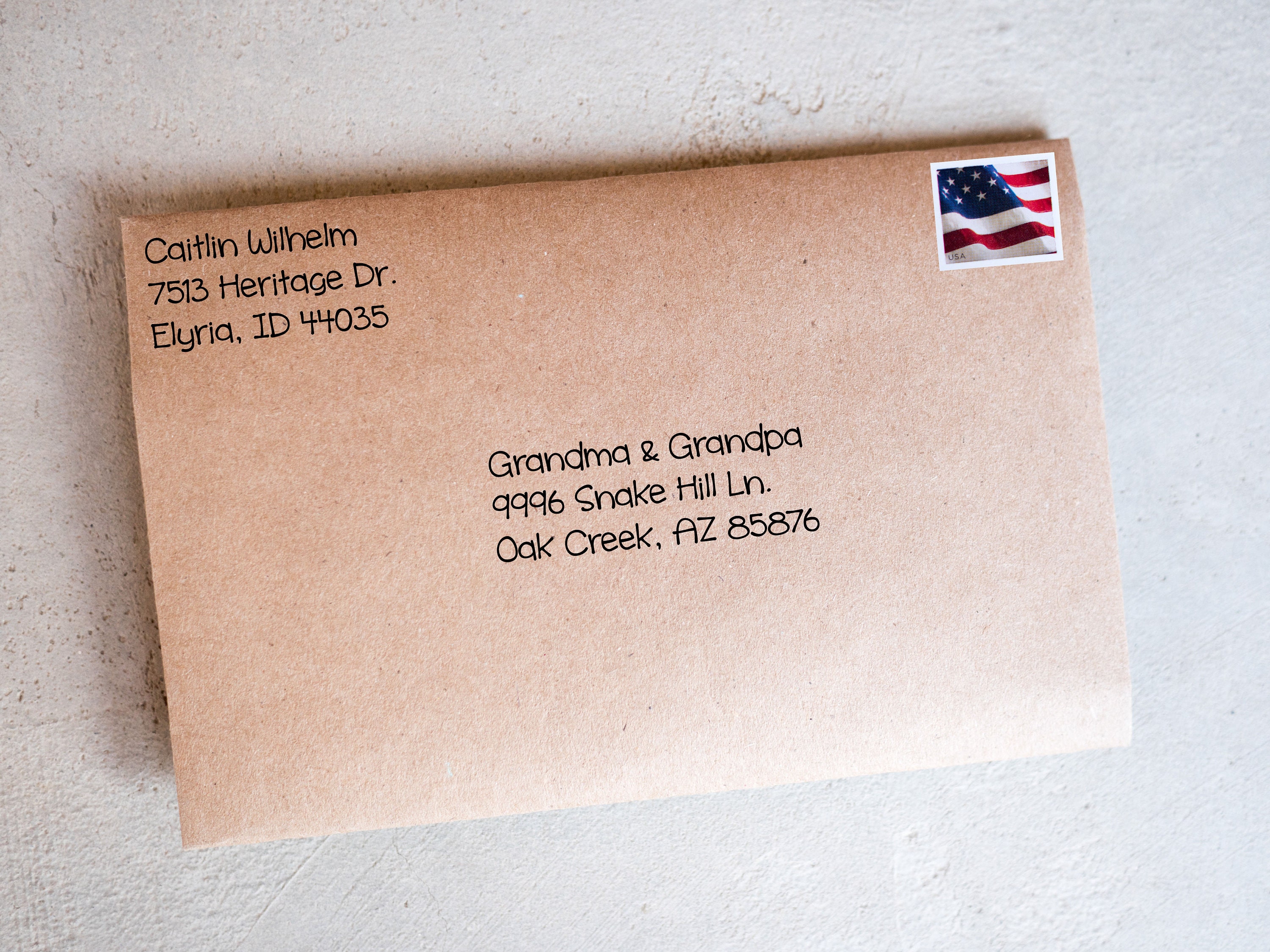 Address the envelope and apply postage