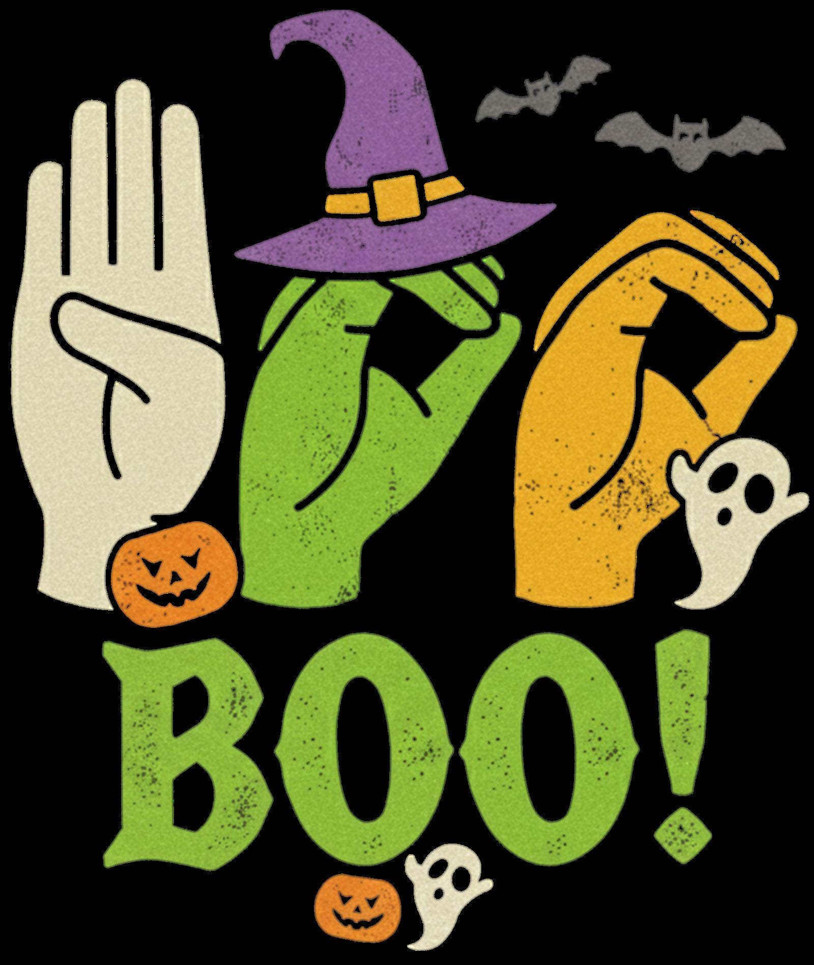 A person wearing a black t-shirt featuring a Halloween-themed design that spells BOO in American Sign Language. The shirt is knotted at the waist, shown in a stylish, rustic home setting.
