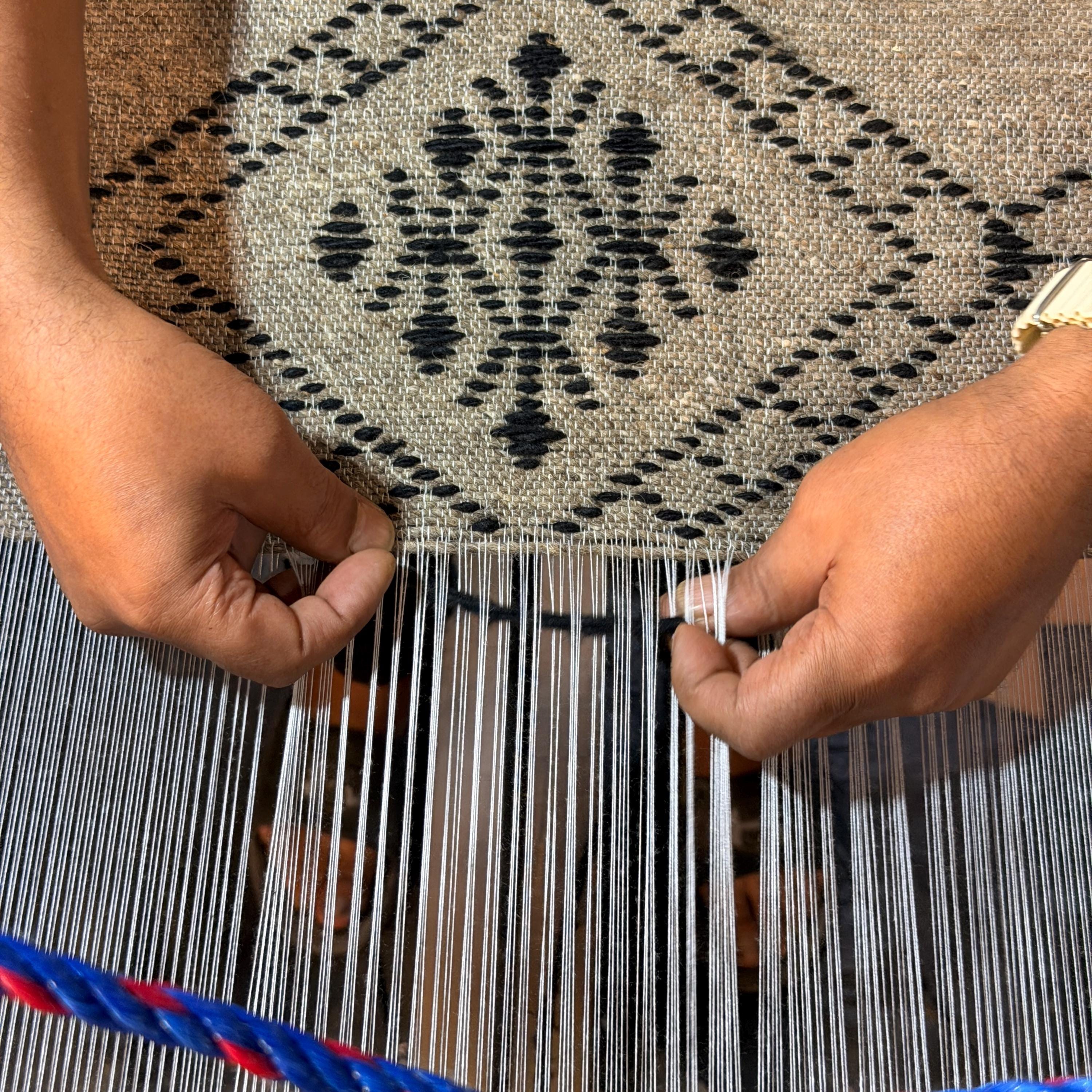 Figure 11. Finishing the edge. The last row is where the quality of a blanket is decided.