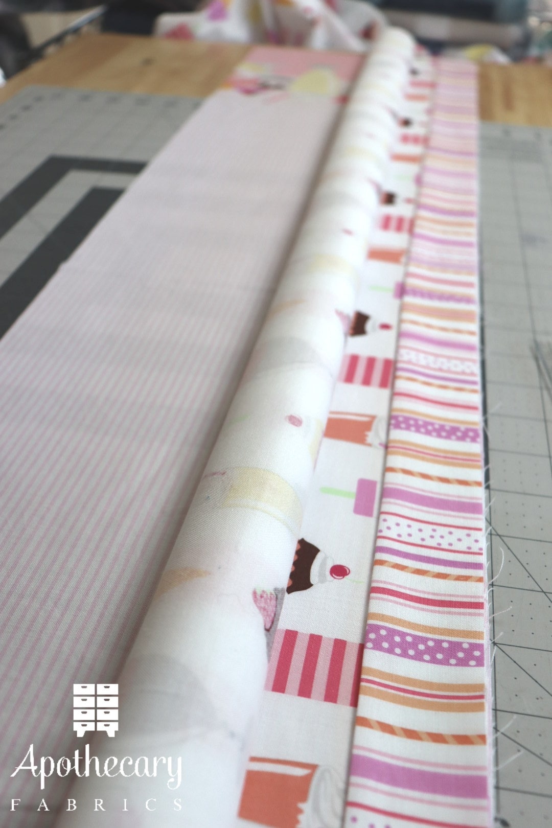 Main part of fabric rolled up tight.