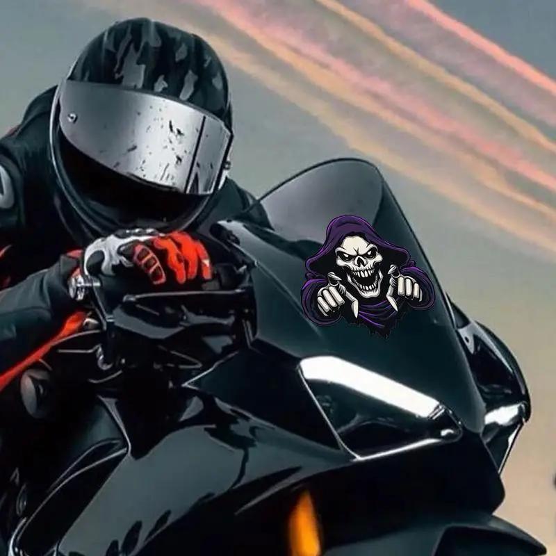 Grim Reaper vinyl decal on a black sport motorbike.